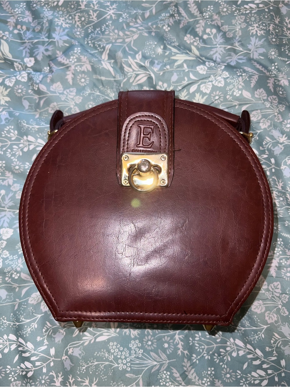 Ella Brown Round Leather Crossbody with Gold Tone Lock